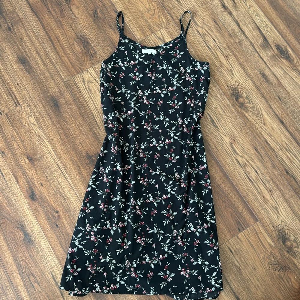 Black floral medium grove tank dress with adjustable straps. Great condition!